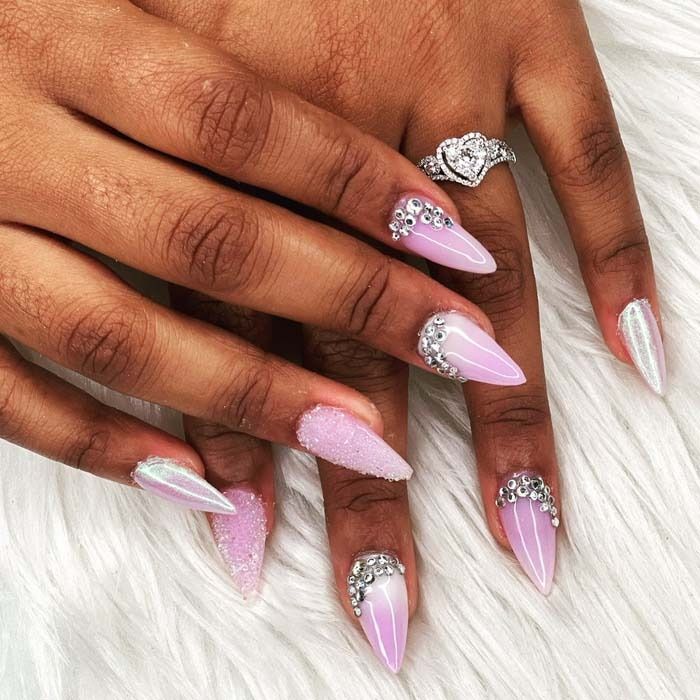 Pink glitter and rhinestone stiletto nail art with ombre French tips