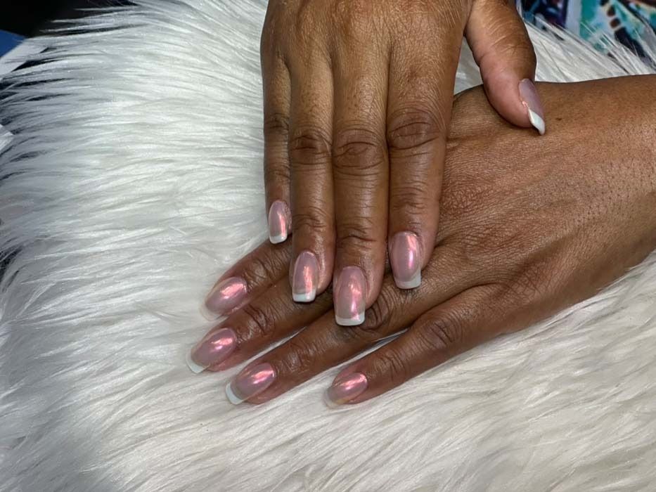 Rose gold chrome manicure with white French tips