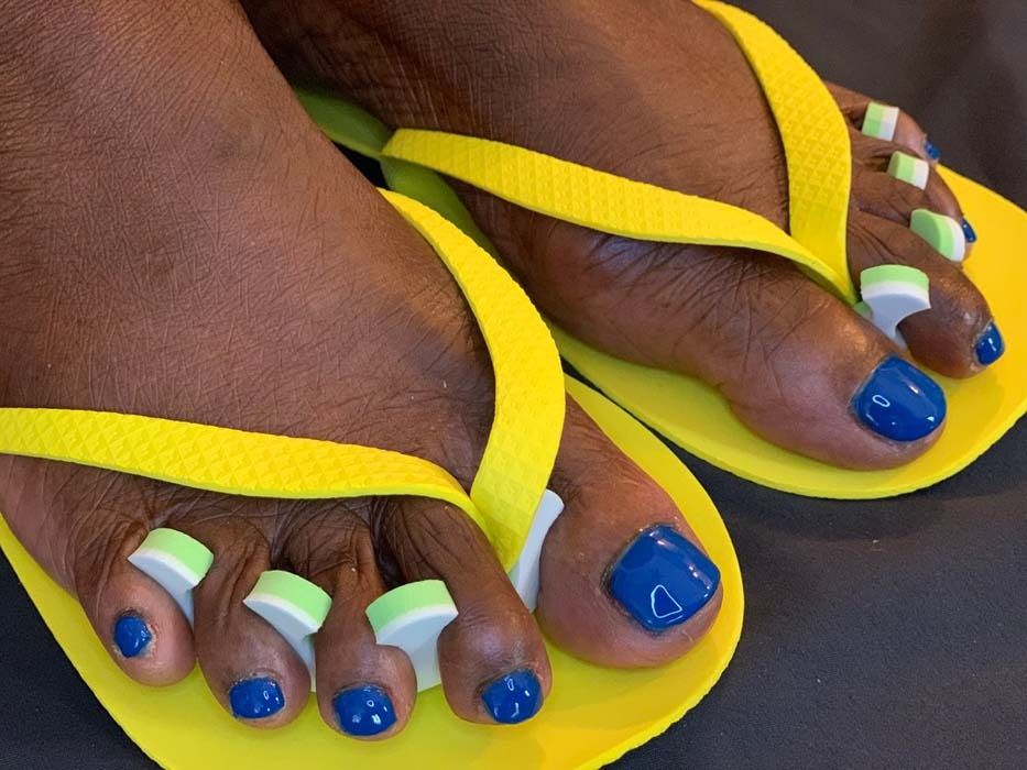 Blue pedicure with yellow flip-flops