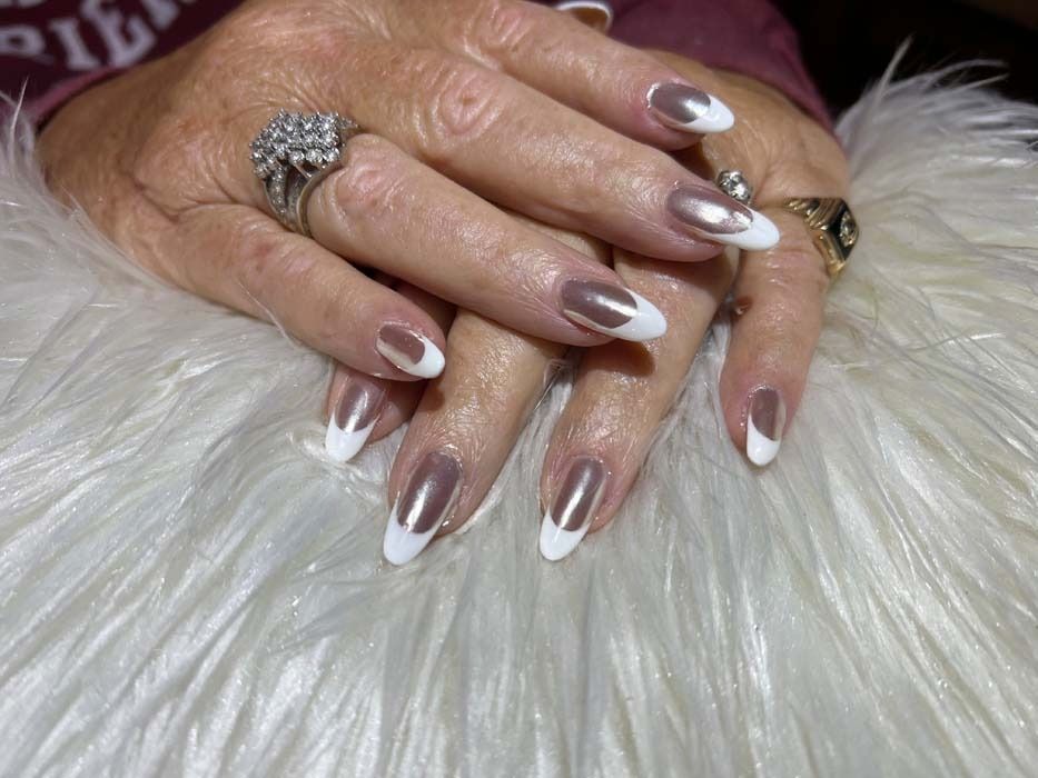 Rose gold chrome manicure with white French tips