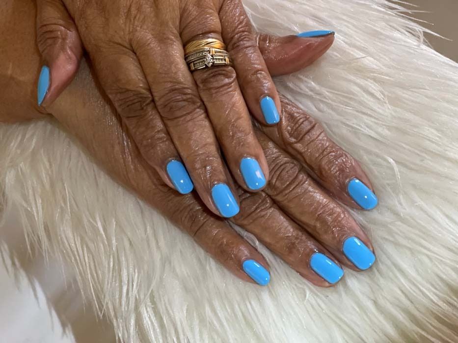 Solid blue gel manicure